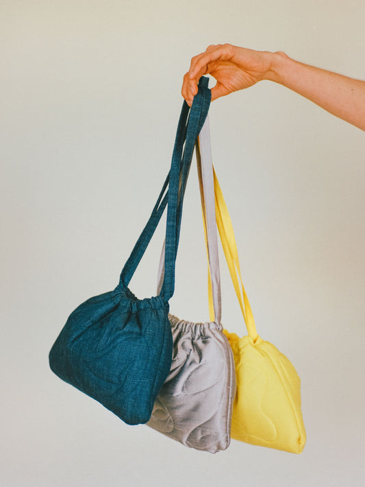 Atelier Magata Satin Bloom Pouch Bag yellow blue denim silver silk yellow silk naked arm
