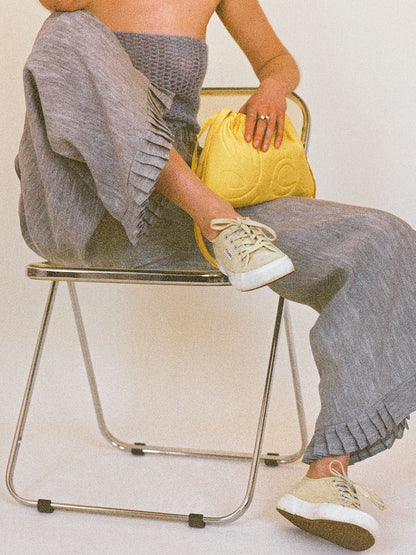 Atelier Magata Satin Bloom Pouch Bag yellow grey ruffle linen trousers lemon yellow Superga