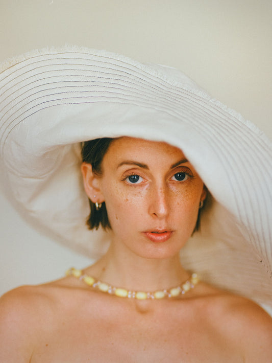 Atelier Magata Shade Bloom Sun Hat off white cotton yellow gemstone beaded necklace and loop earrings